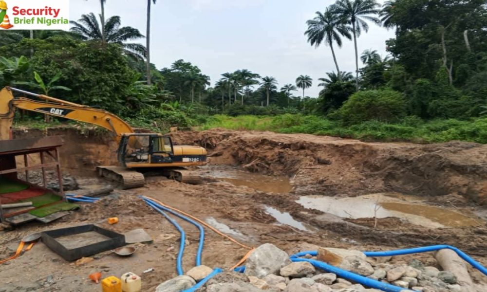 illegal mining site in Tosho