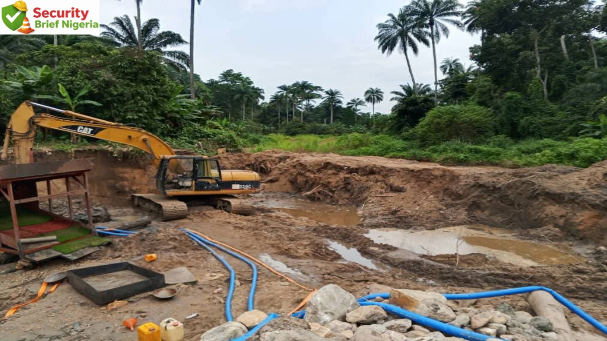 illegal mining site in Tosho